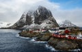 Famous tourist attraction Hamnoy fishing village on Lofoten Islands, Norway with red rorbu houses in winter.