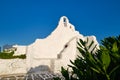 Famous tourist landmark, Mykonos, Greece. White Greek Orthodox church of Panagia Paraportiani, town of Chora on island Royalty Free Stock Photo