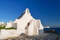 Famous tourist landmark, Mykonos, Greece. White Greek Orthodox church of Panagia Paraportiani, town of Chora on island Royalty Free Stock Photo