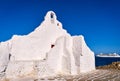 Famous tourist landmark, Mykonos, Greece. White Greek Orthodox church of Panagia Paraportiani, town of Chora on island Royalty Free Stock Photo