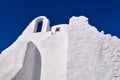 Famous tourist landmark, Mykonos, Greece. White Greek Orthodox church of Panagia Paraportiani, town of Chora on island Royalty Free Stock Photo