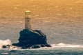 Famous Tourlitis lighthouse in Andros island in Greece.