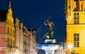 Famous tourst attraction Neptune\'s fountain on Dluga street at night. Gdansk, Poland Royalty Free Stock Photo