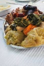 The famous traditional dish of the Azores is Cozido das Furnas.