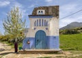 Famous traditional door on the road into Chefchaouen, a city in northwest Morocco noted for its buildings in shades of blue.