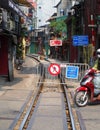 famous train street in Hanoi with daily life scene and no trespassing sign, Vietnam