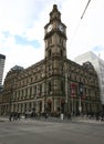 Classic and historic stone exterior of former General Post Office with clock tower in Melbourne CBD, Victoria, Australia