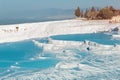 Travertines in the Turkish resort of Pamukkale near the city of Denizli. White mineral rock outcrops and thermal water Royalty Free Stock Photo