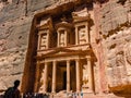 Famous Treasury of Petra. Place where there are always lot of tourists. Ancient building hollowed out in red stone