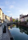 The famous Triple Bridge across the Ljubljanica River with Franc