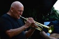 Famous trumpetist, composer and painter Laco Deczi plays solo on trumpet during live gig with his Celula New York band.