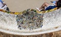 A famous undulating, continuous, tile-covered serpentine bench details in Park GÃÂ¼ell, Barcelona, Catalonia, Spain.