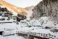 A famous valley hot spring covered in snow at Yamanouchi in Nagano. Royalty Free Stock Photo