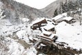 A famous valley hot spring covered in snow at Yamanouchi in Nagano. Royalty Free Stock Photo