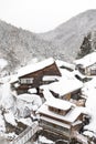 A famous valley hot spring covered in snow at Yamanouchi in Nagano. Royalty Free Stock Photo