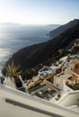 Famous view of the colorful village of Oia, Santorini, Greece. Vertical. The neighboring islands overlook Royalty Free Stock Photo