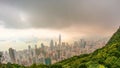 The famous view of Hong Kong from Victoria Peak timelapse. Taken at sunrise with colorful clouds over Kowloon Bay. Royalty Free Stock Photo