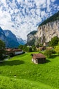 Amazing view of famous Lauterbrunnen town in Swiss Alps valley with beautiful Staubbach waterfalls in the background, Switzerland Royalty Free Stock Photo