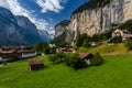 Famous view of Lauterbrunnen town in Swiss Alps valley with gorgeous Staubbach waterfalls in the background, Switzerland Royalty Free Stock Photo