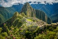 Famous view of Machu Picchu city in pink flowers, Peru Royalty Free Stock Photo