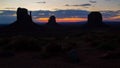 Famous view of Monument Valley before sunrise with the Mittens and Merrick butte Royalty Free Stock Photo