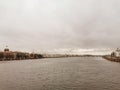 Famous view of Saint Petersbug city, Russia from Neva river. Mainly cloudy