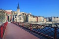 Famous view of Saone river and red footbridge in Lyon city Royalty Free Stock Photo