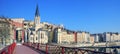Famous view of Saone river and red footbridge in Lyon city Royalty Free Stock Photo
