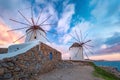 Traditional windmills at sunrise, Santorini, Greece Royalty Free Stock Photo