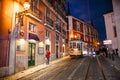 Famous vintage tram of of Alfama, in the oldest district of the Old Town, at night, Lisbon, Portugal Royalty Free Stock Photo