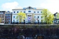 Famous white building on Amstel river, Netherlands, Europe