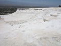 Famous white calcium travertines and pools in Pamukkale, Turkey.