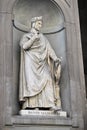 Famous white marble monument of Dante Alighieri by Enrico Pazzi in Piazza Santa Croce, next to Basilica of Santa Croce, Florence,