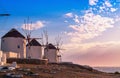 Famous windmills on the island of Mykonos at sunset. Royalty Free Stock Photo