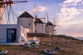 Famous windmills on the island of Mykonos at sunset. Royalty Free Stock Photo