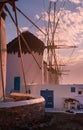 Famous windmills on the island of Mykonos at sunset. Royalty Free Stock Photo