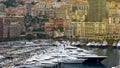 Famous yacht club in Monaco, many expensive boats moored in harbor, luxury life Royalty Free Stock Photo