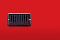 Fan air ventilation box of car isolated on red background Royalty Free Stock Photo