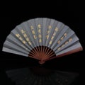 Fan with Chinese painting close-up. Royalty Free Stock Photo