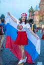 Fan of FIFA kokoshnike with Russian flag on red square in Moscow Royalty Free Stock Photo