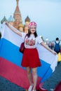 Fan of FIFA kokoshnike with Russian flag on red square in Moscow Royalty Free Stock Photo