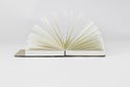 Fan open small unfold notepad with blank light beige pages. Notebook, sketchbook, book. White. Minimalism Royalty Free Stock Photo