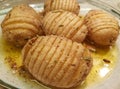 Some hasselback potatoes Royalty Free Stock Photo