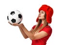 Fan sport woman player in red uniform and russian winter hat hold soccer ball celebrating Royalty Free Stock Photo