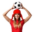 Fan sport woman player in red uniform and russian winter hat hold soccer ball celebrating Royalty Free Stock Photo