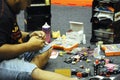 The fan of Tamiya mini race car preparing their car for the racing competition.