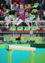 Fan Yilin of China competes during a balance beam event of women`s team final of Artistic Gymnastics at the 2016 Rio Olympic Games Royalty Free Stock Photo