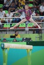 Fan Yilin of China competes during a balance beam event of women`s team final of Artistic Gymnastics at the 2016 Rio Olympic Games Royalty Free Stock Photo