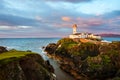 Fanad head at Donegal, Ireland with lighthouse at sunset Royalty Free Stock Photo