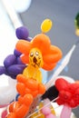 Fancy balloons selling at the weekend market. Colorful balloons for kids birthday party. lion balloon